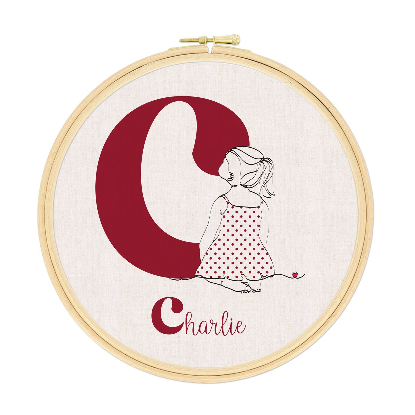 Initiale personnalisée sur tissu tendu